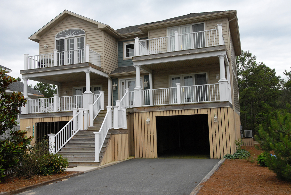 White Railing on Entire Front of Building